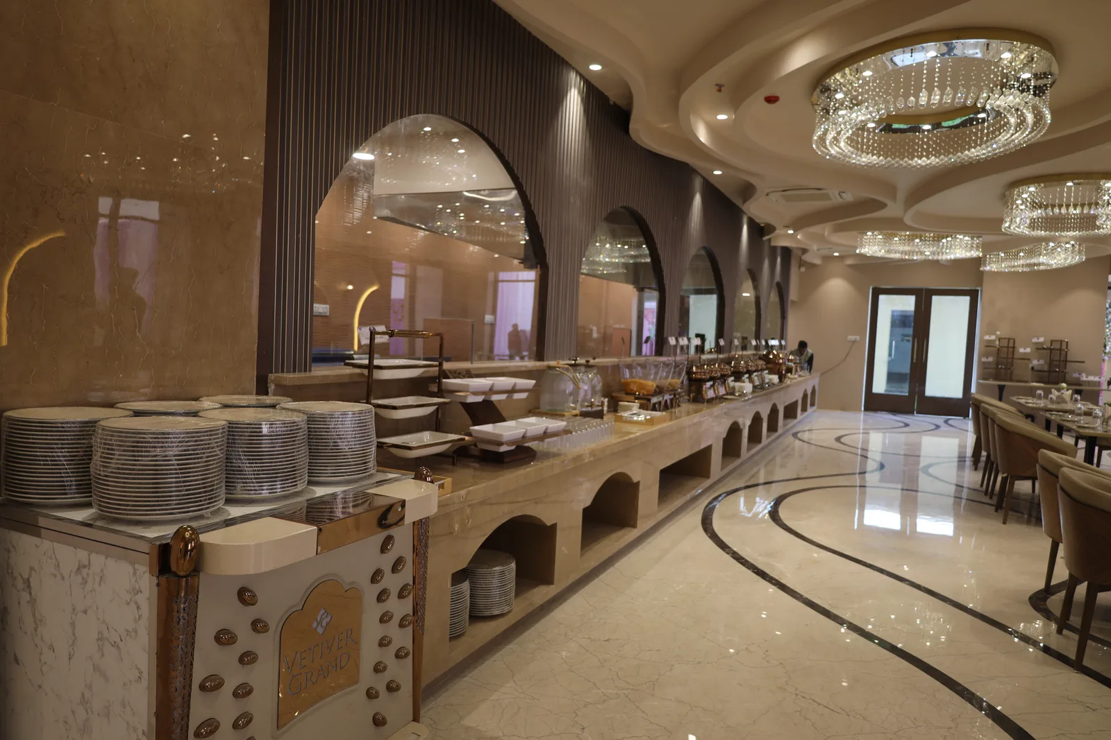 A Vetiver Grand branded display at the buffet, where Kasturi's pure-vegetarian kitchen serves engagement lunches and dinners in Jabalpur.